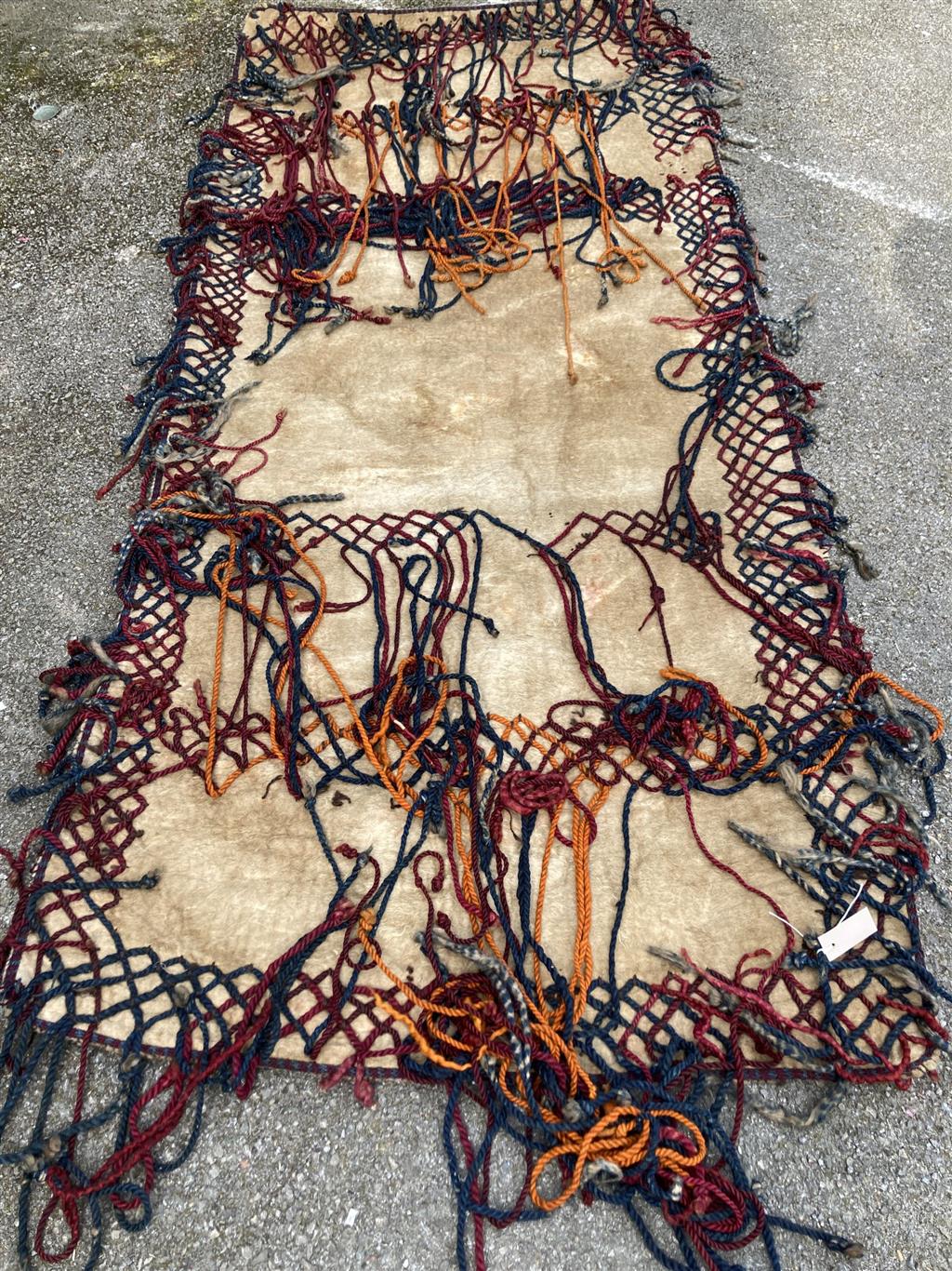 A Central Asian wool rug, 122 x 450cm